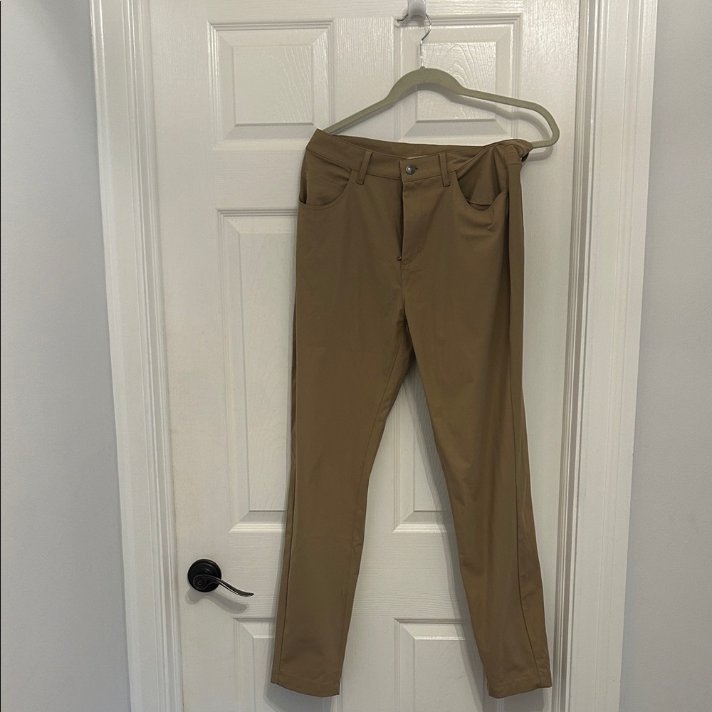 Fabletics Men's Tan Performance Khakis. 30x32